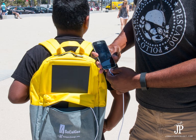 Use a solar backpack to keep electronics charged on the beach or when camping.