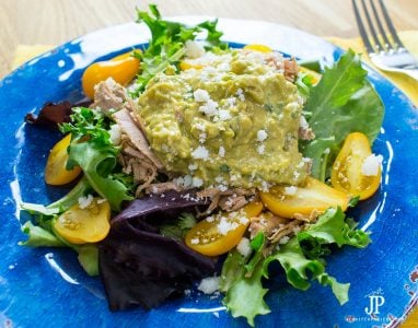 YUM! Shredded Pork salad with creamy guacamole and pear tomatoes. No dressing necessary - by jenniferppriest
