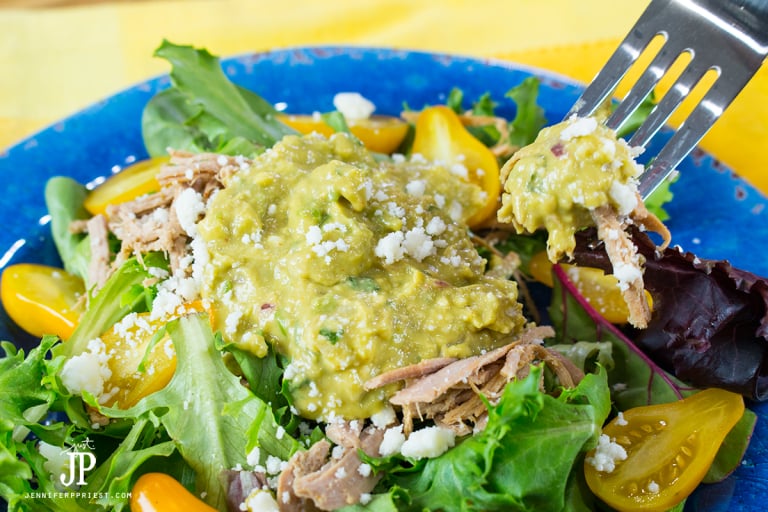 YUM! Shredded Pork salad with creamy guacamole and pear tomatoes. No dressing necessary - by jenniferppriest