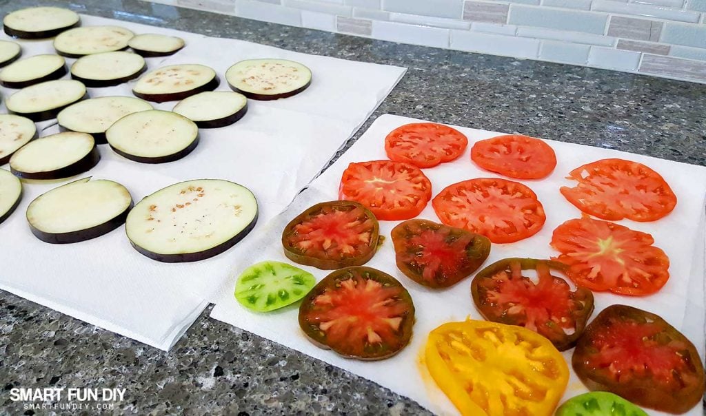 Drain eggplant before grilling. Grilled eggplant and heirloom tomato salad recipe https://www.smartfundiy.com/mothers-day-lunch-grilled-eggplant/ #SoWorthIt