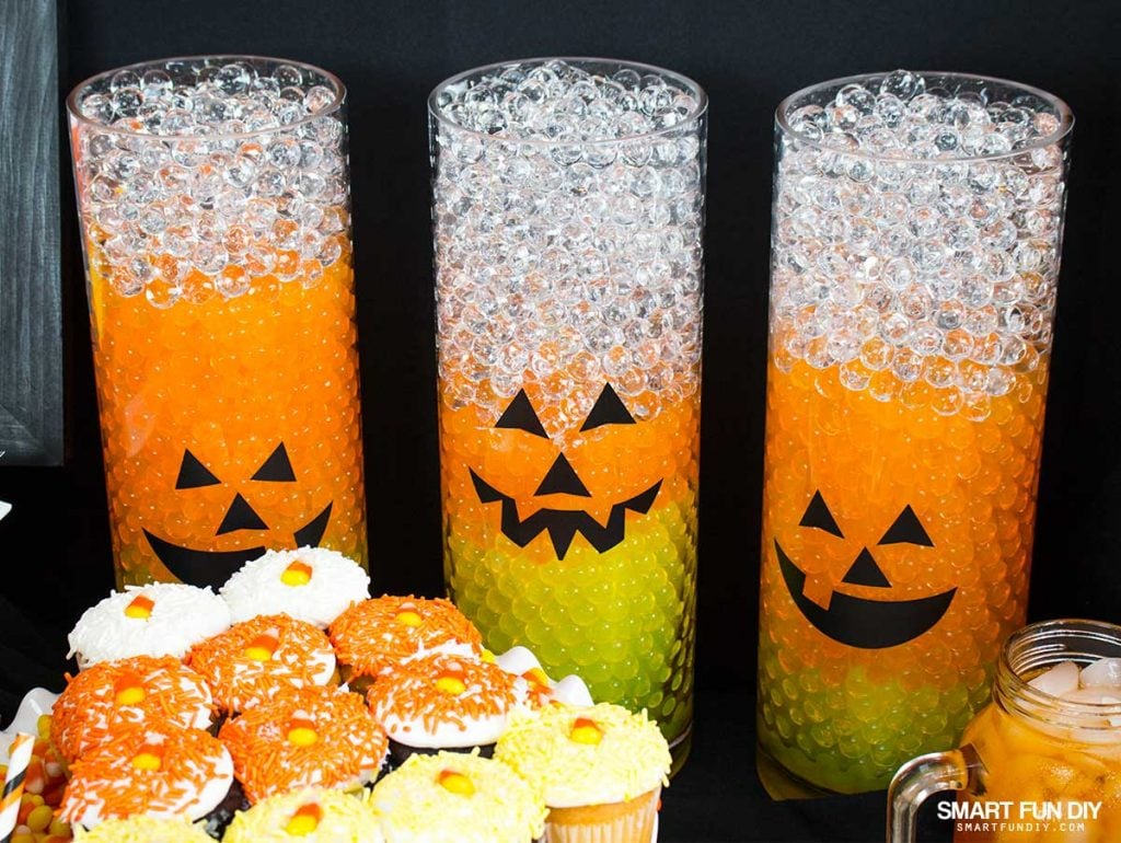 Throw a CANDY CORN Halloween party this year! make decor like these candy corn vases with water beads from GEMNIQUE.