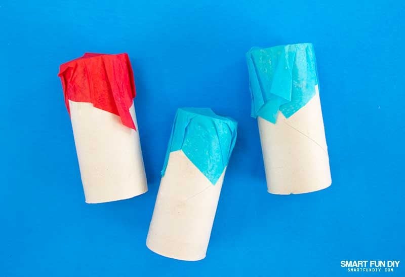 Cover end of toilet paper tube with square of tissue paper