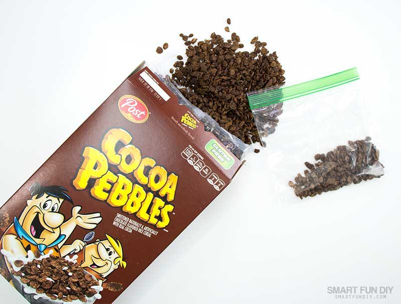place cocoa pebbles cereal into zip top bag and crush into powder