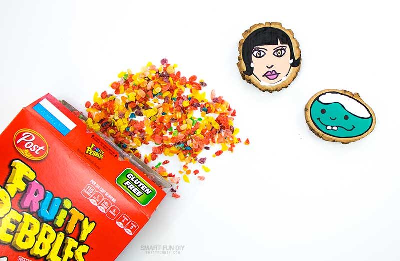 apply glue to self portraits on wood slices