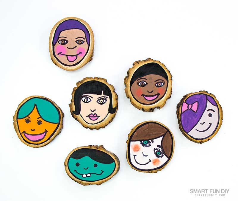 self-portrait for kids craft idea on wood slices