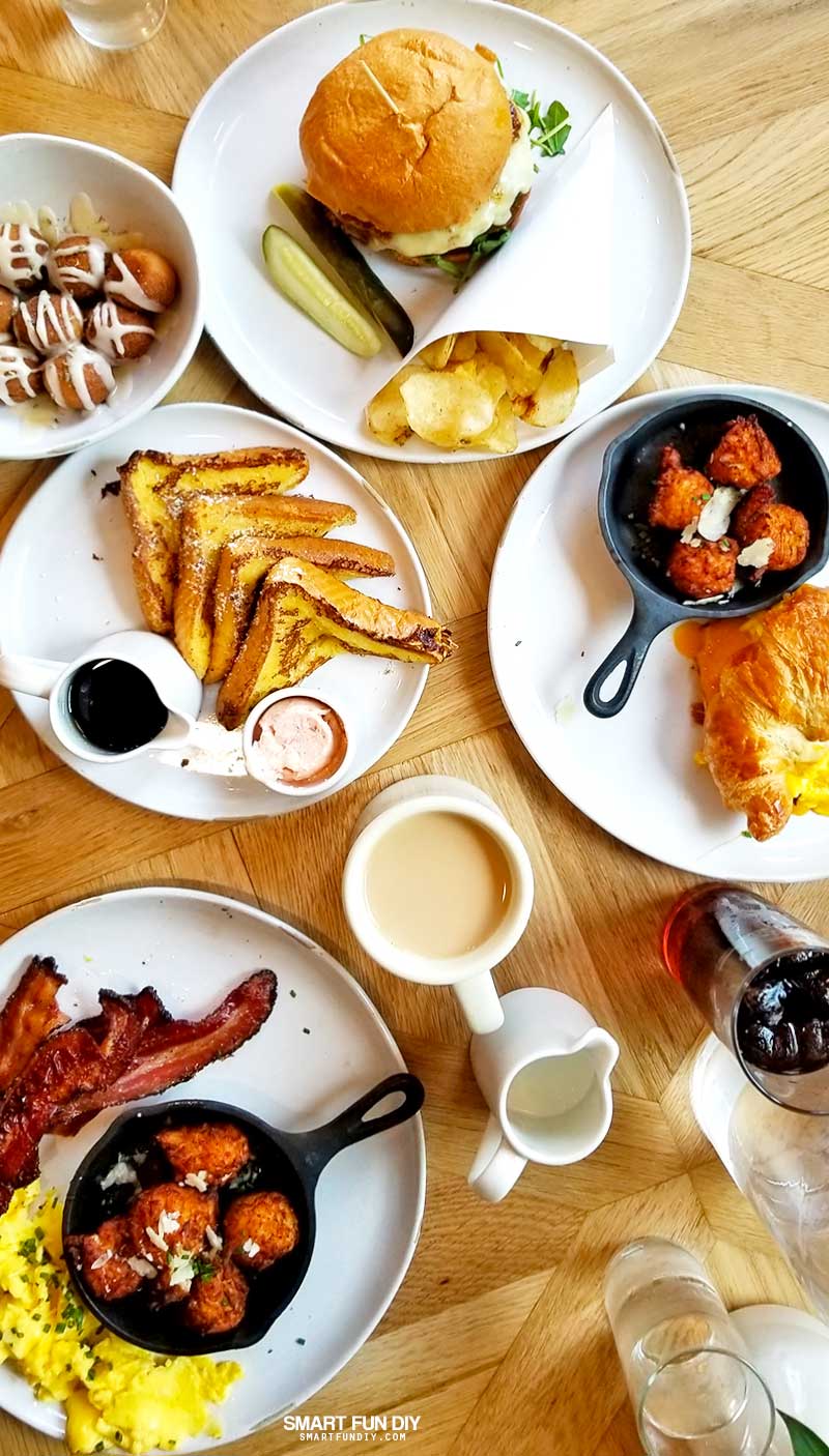 Magnolia Table restaurant food - plates on table in flatlay