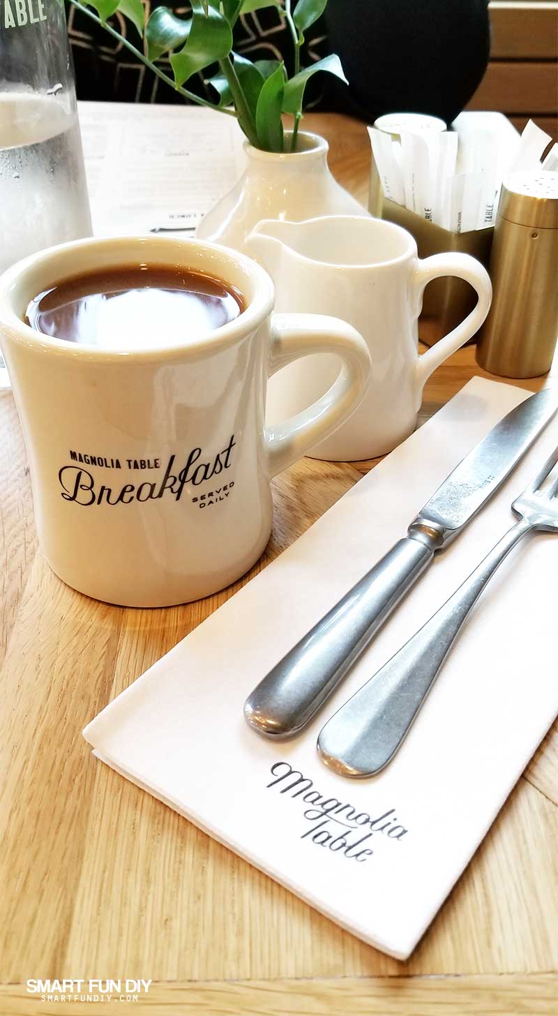 water bottle, coffee, and creamer at Magnolia Table restaurant