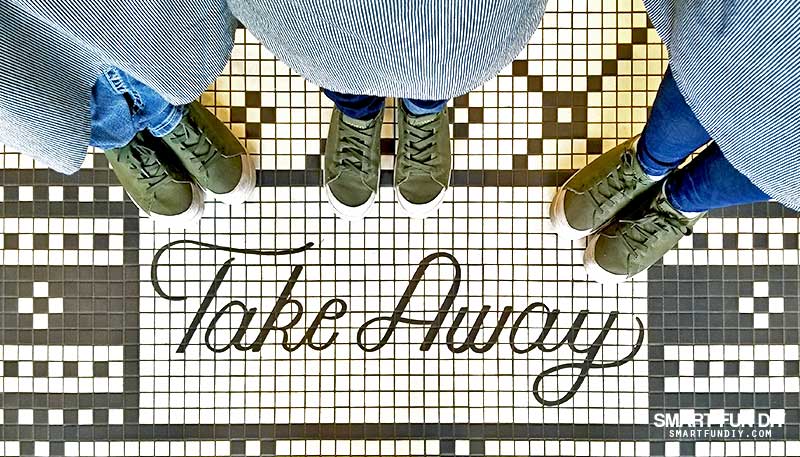 Mosaic tile floor "take away" surrounded by feet Magnolia Table restaurant
