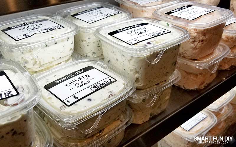 packaged salads display in Take Away Market at Magnolia Table restaurant