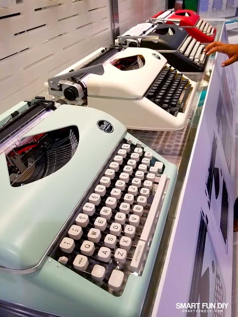 Colorful typewriters at WeRMemoryKeepers' 2018 Creativation booth