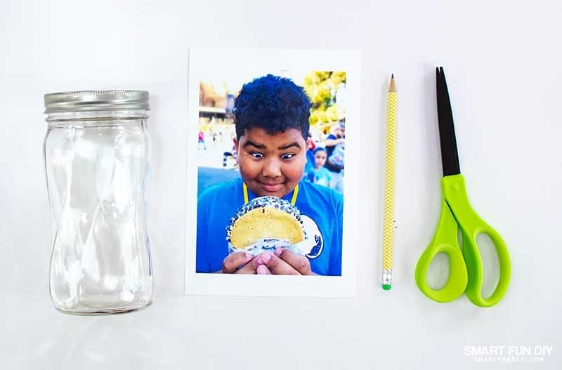 trace mason jar onto photo and cut out with scissors