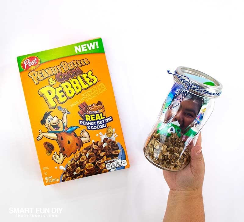 Use peanut butter and cocoa pebbles to add scent to mason jar centerpieces