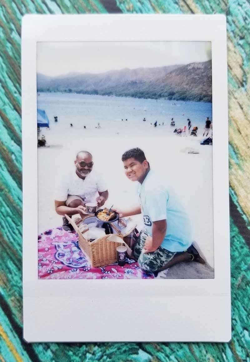 instant camera photo at lake