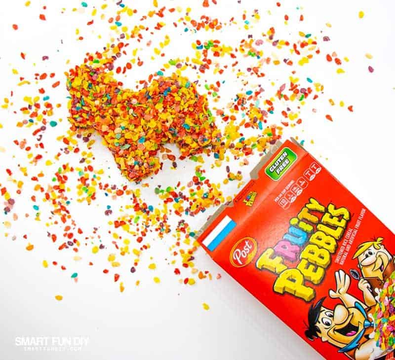 DIY pinata from cardboard covered in Fruity Pebbles cereal