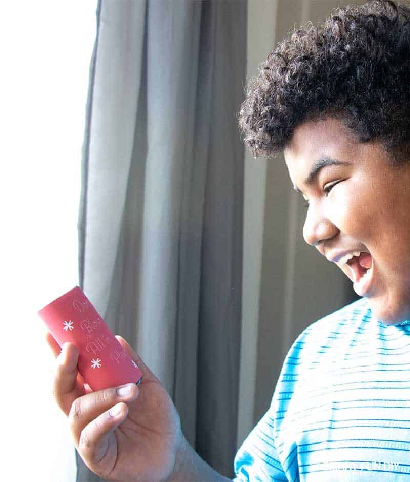 boy reacting to don't blow it all in once place money gag gift idea