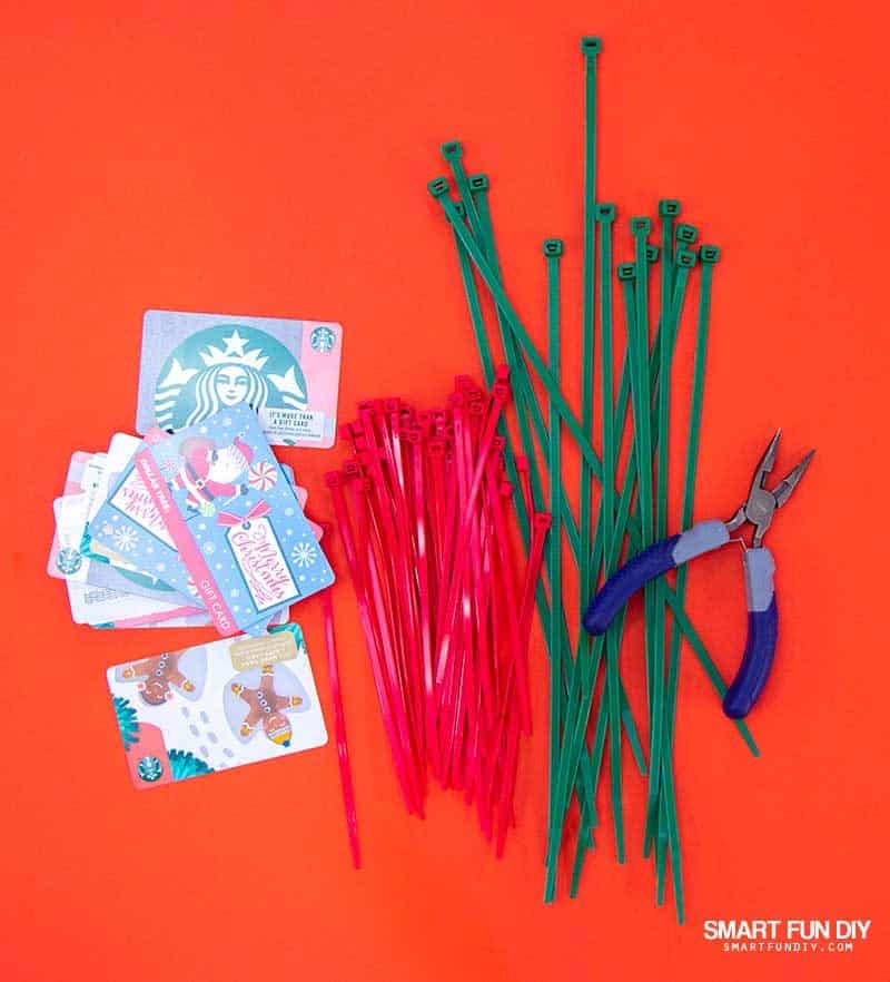 supplies to make gift card brick: gift cards, zip ties, and pliers