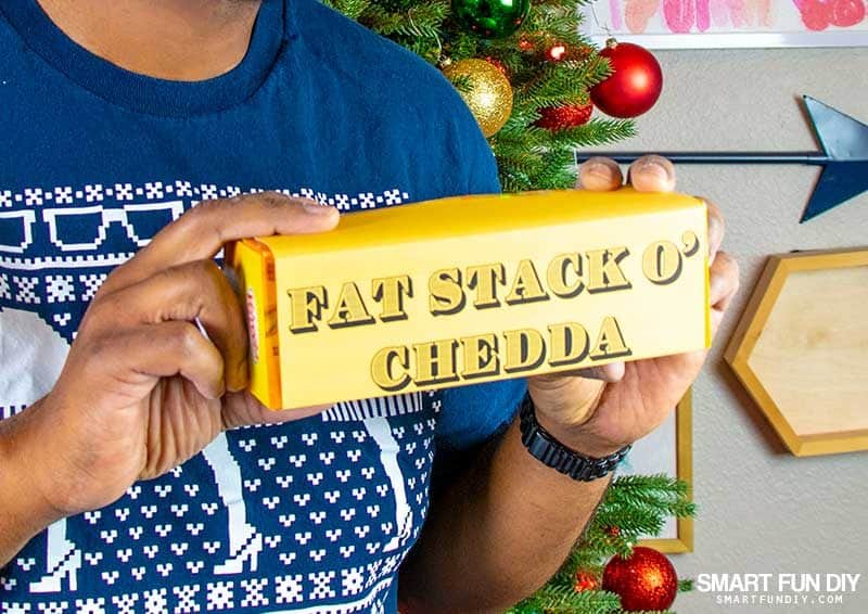 fat stack o chedda gag gift idea - man holding velveeta box with printable label on it