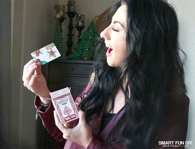 girl reacts to gift card playing card deck gag gift idea