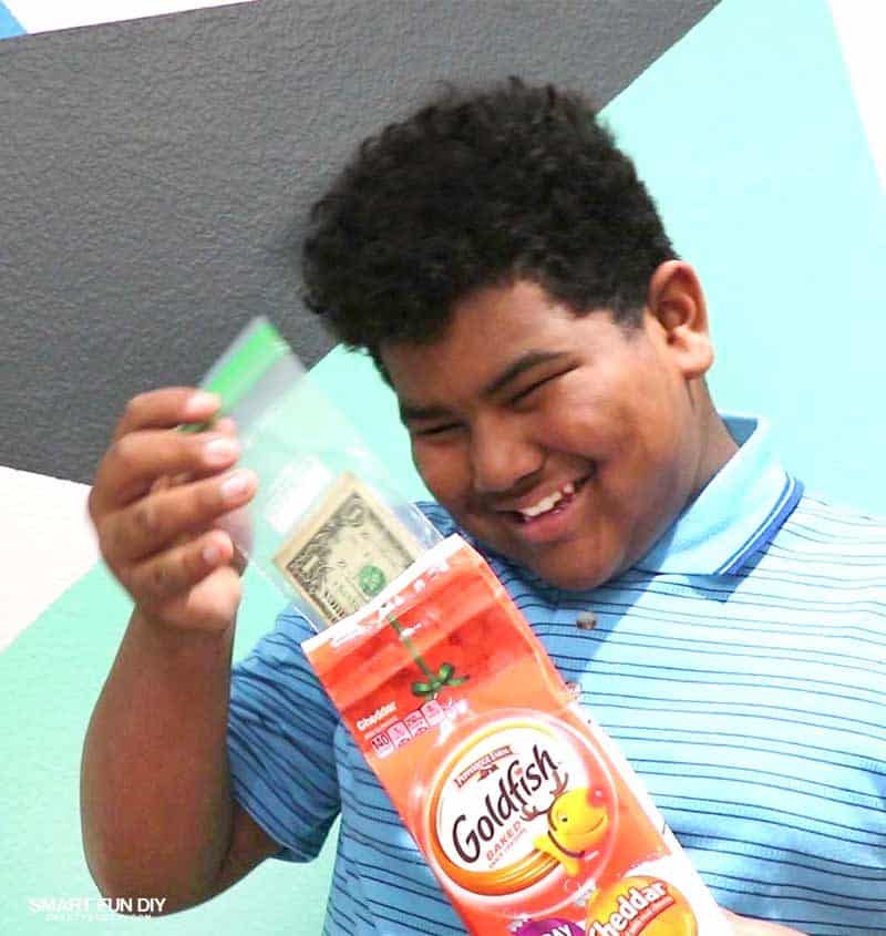 boy opening goldfish crackers gag gift idea