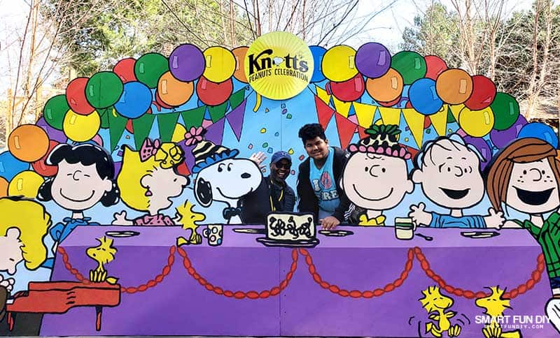 Knott's PEANUTS Celebration birthday party photo opp in Camp Snoopy with father and son