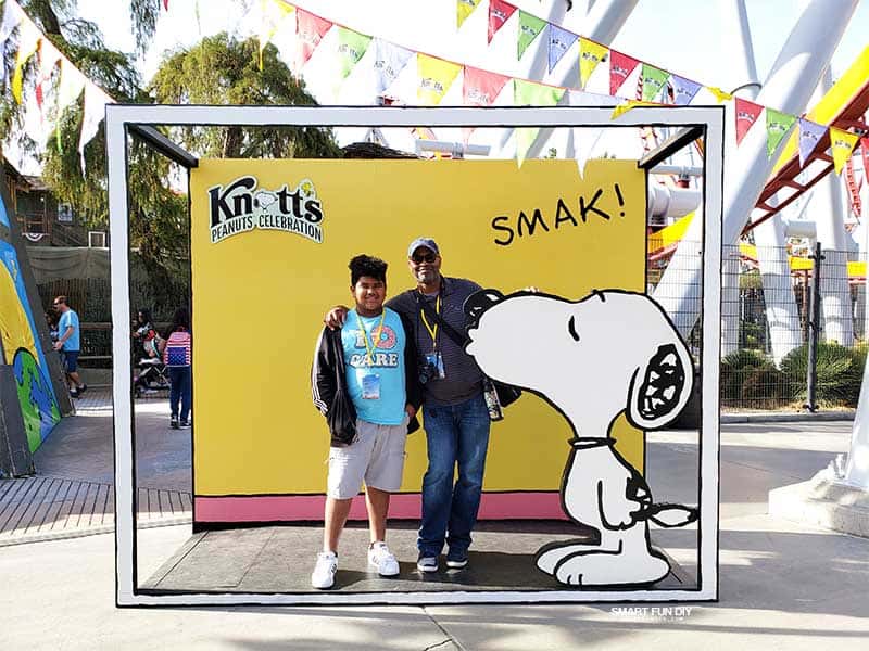 Snoopy photo opp at Knott's PEANUTS Celebration with father and son
