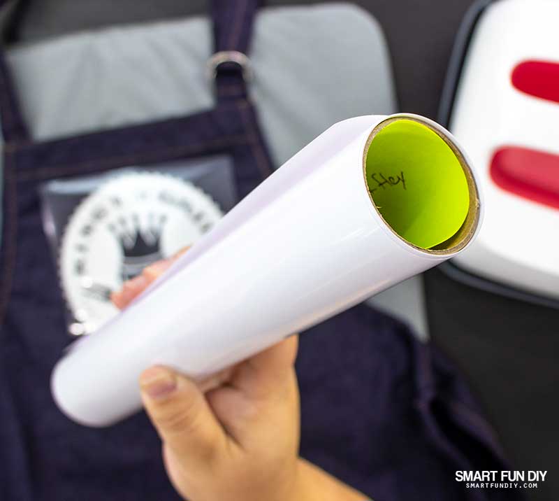 Roll of heat transfer vinyl with sticky note inside the roll