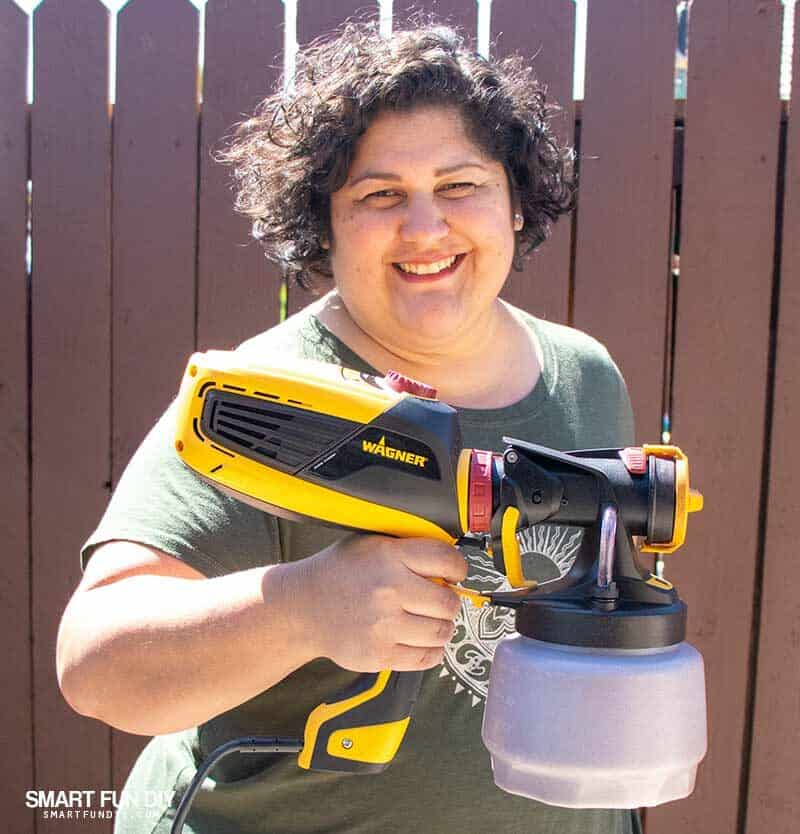 Woman holding Wagner Flexio Sprayer