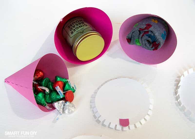 Small gifts inside paper cones, ready to be closed with a circle on the bottom, cut with Cricut Maker